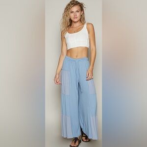 POL Loose knit wide pants, ribbed fabrication, elastic waistband. Size: Various